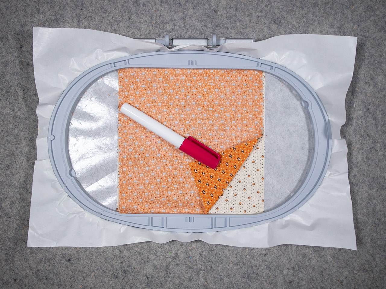dhere the backing fabric with a dab in the four corners of the 6 ½” square.