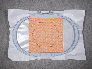 stitch the two pieces of fabric together.