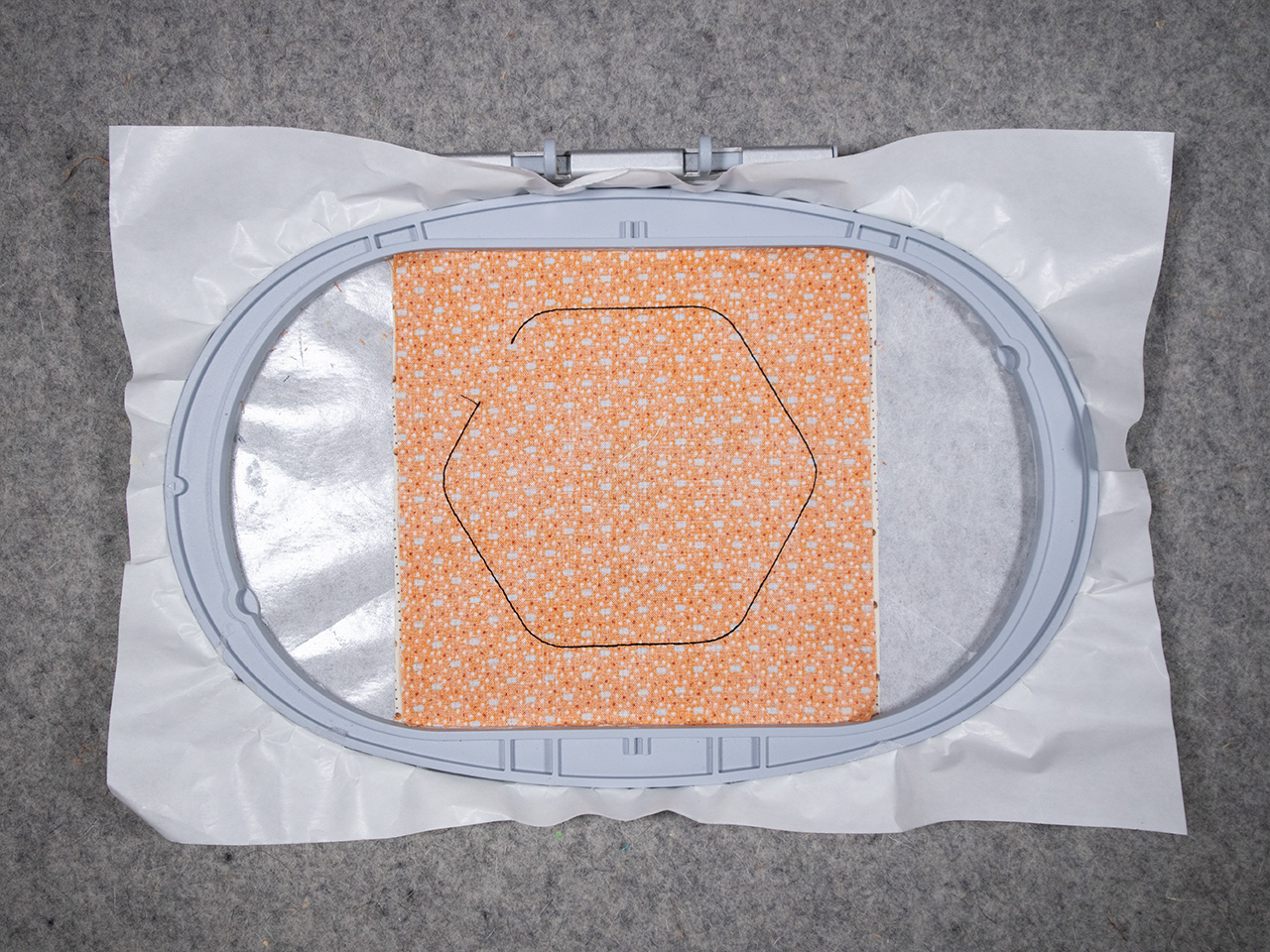 stitch the two pieces of fabric together.