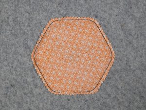 trim ¼” from the seam line all the way around.