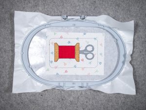 Step Fill stitch the scissors on top of the spool