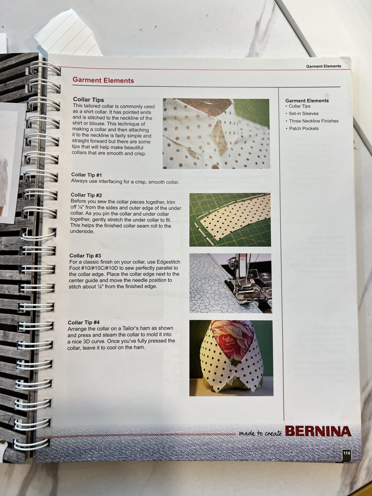 Open BERNINA BIG Book of Fashion Sewing showing illustrated collar construction tips, including interfacing, trimming, edgestitching, and pressing techniques.