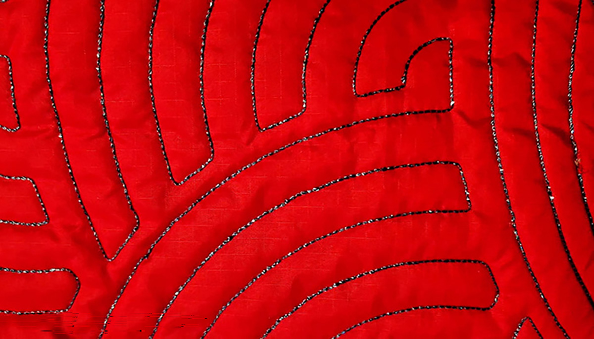 View of the quilted ripstop with dazzle thread.