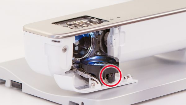 Gently wipe the lens on the bobbin sensor