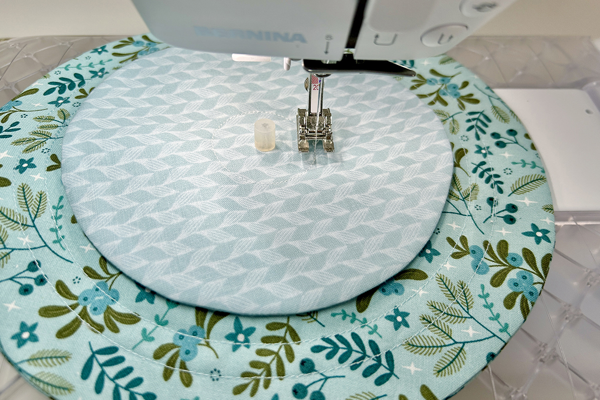 small circle on top of large circle at machine stitching