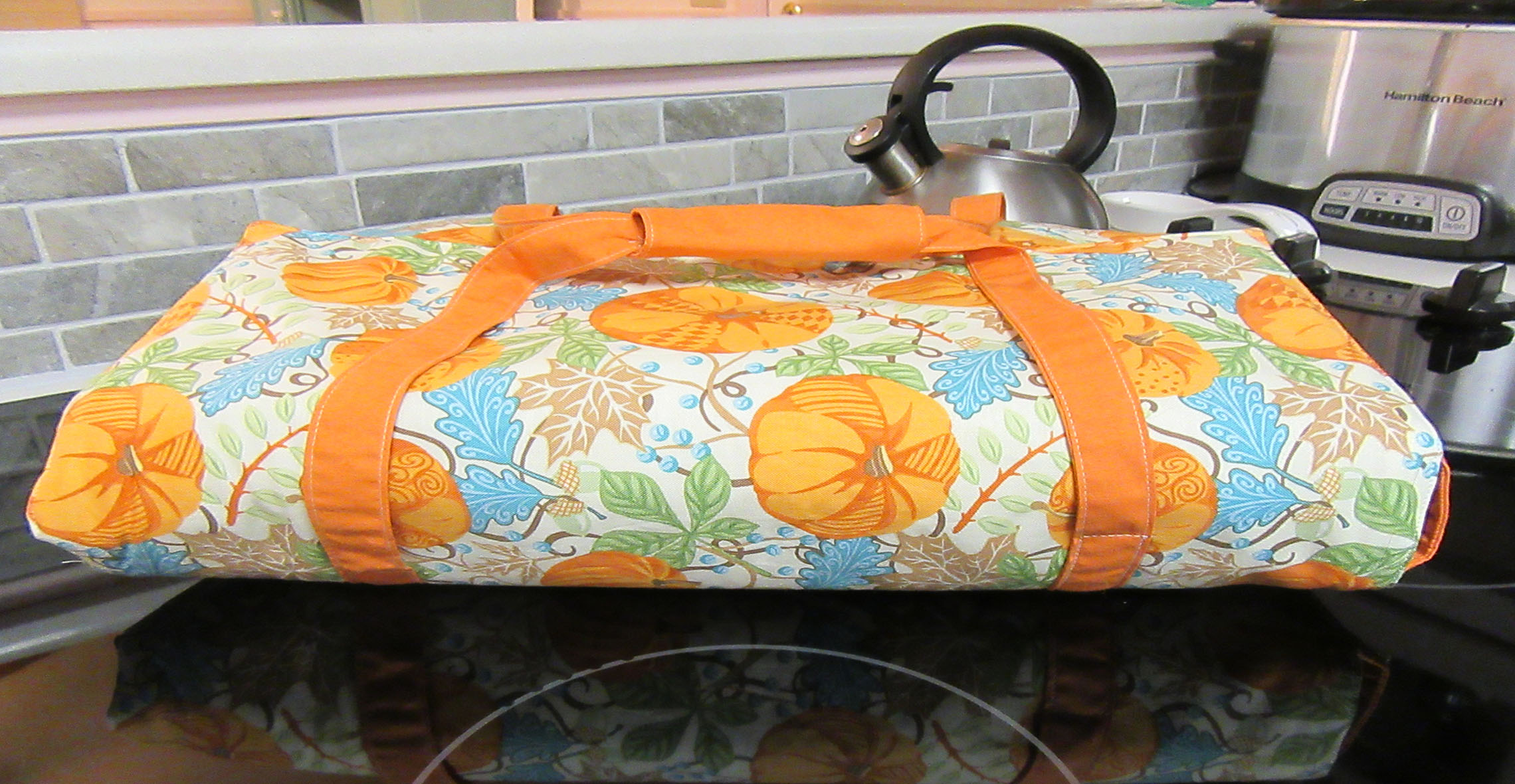 casserole dish laying on stove